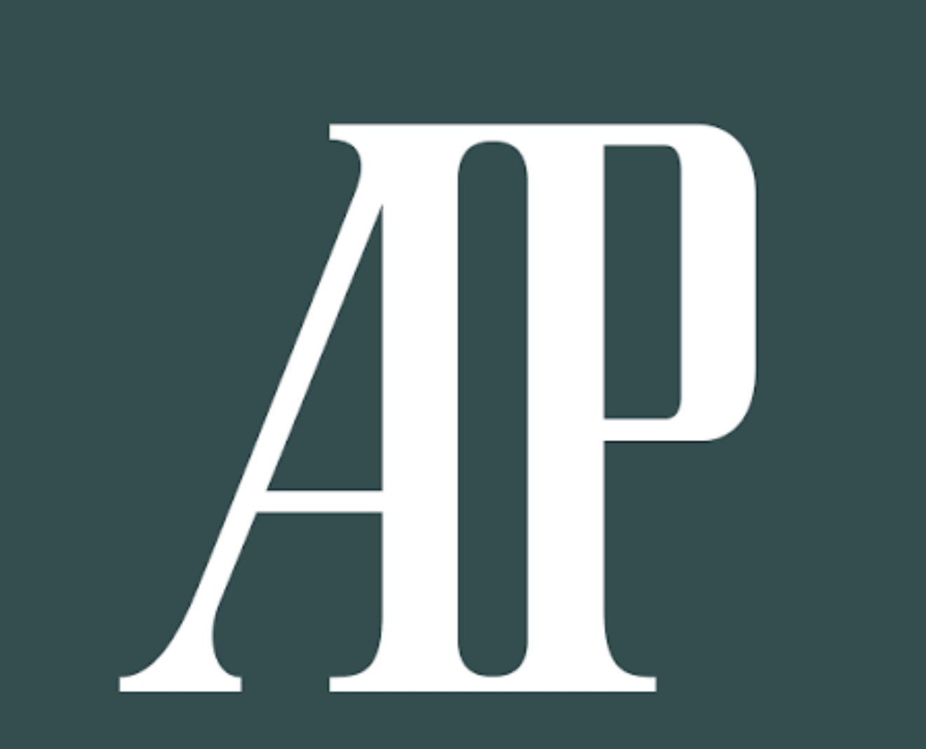 Suited group shot with luxury watches